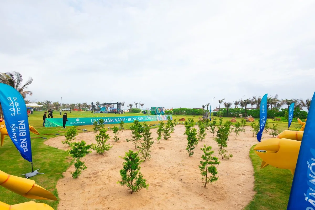 Khu vực trồng cây non với banner Ươm Mầm Xanh Bừng Sức Sống cờ xanh tại Carabeach CaraWorld Khu vực trồng cây non với banner Ươm Mầm Xanh Bừng Sức Sống cờ xanh tại Carabeach CaraWorld
